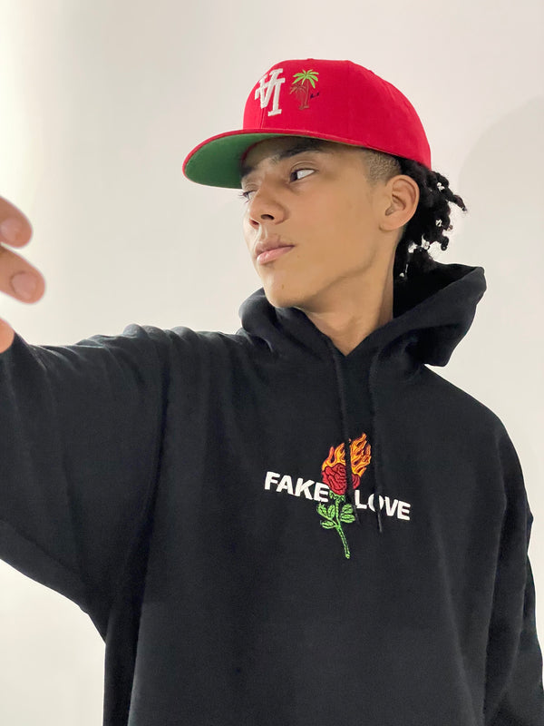 Fake LoveHoodie - Negro